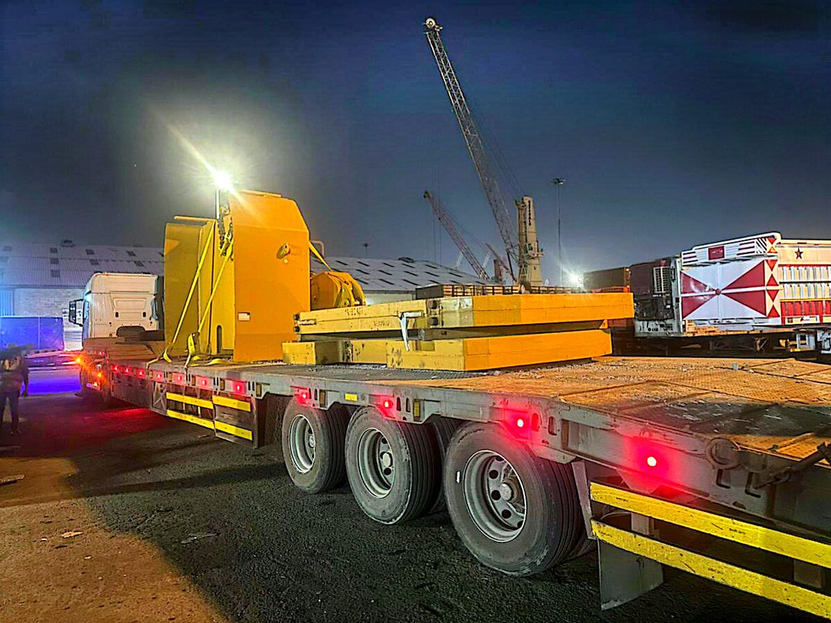 Secured flatbed load in transit